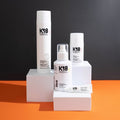 A selection of k18 hair product bottles displayed on white boxes